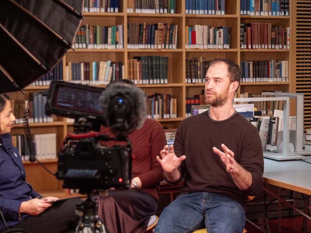 Dr Maria Avxentevskaya and Dr Ben Johnson being interviewed