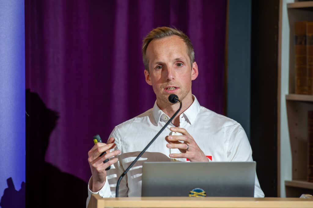 Iain Hyrnaszkiewicz speaking