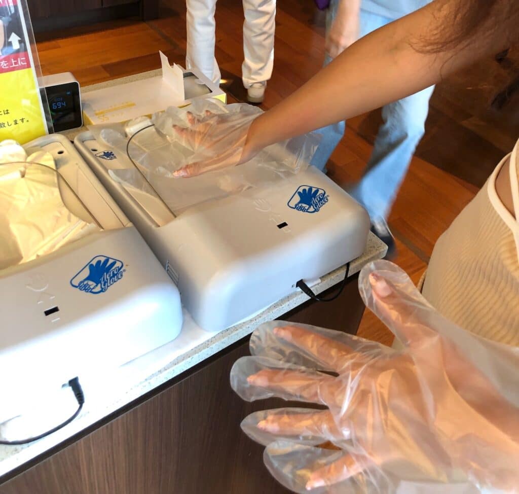 Glove dispensers in a Japanese restaurant.