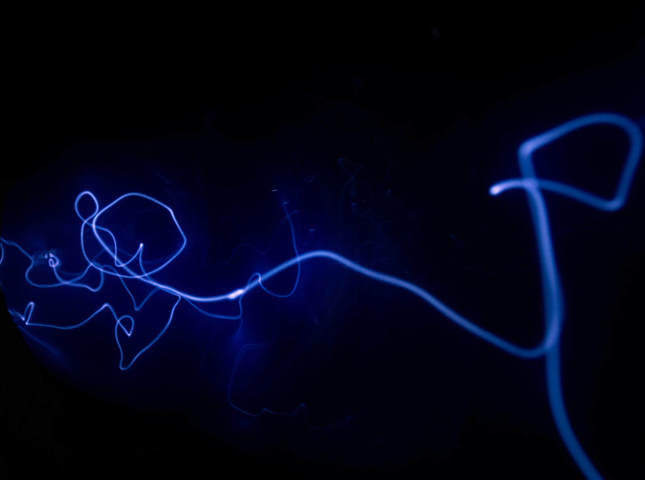 image of light squiggle against dark background