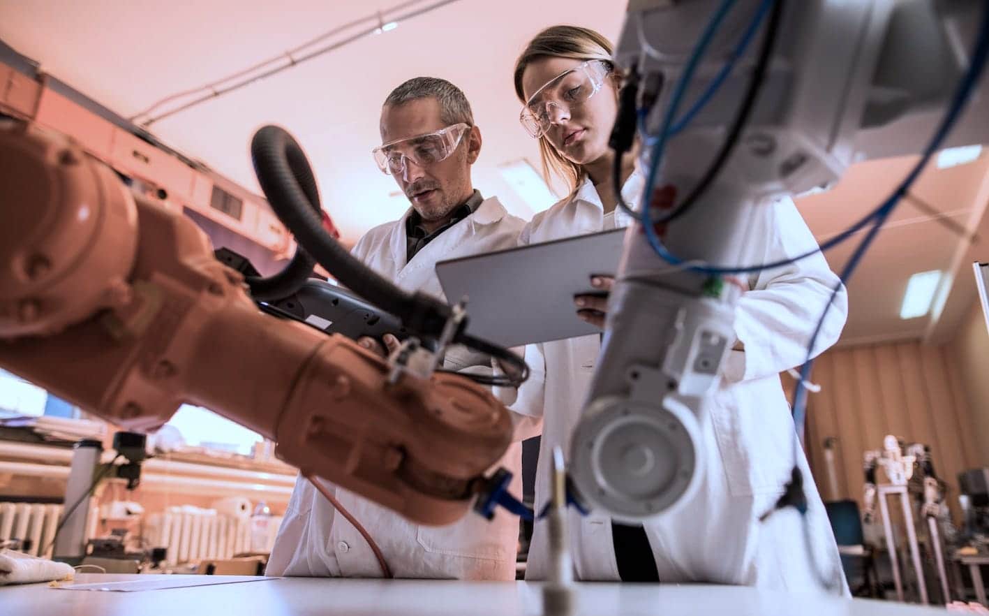 two lab technicians at work