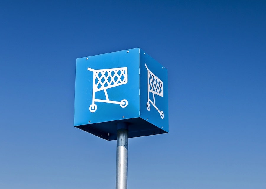Shopping cart sign in parking lot